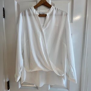 Women’s high-low ivory blouse, size Large, brand new without tags.